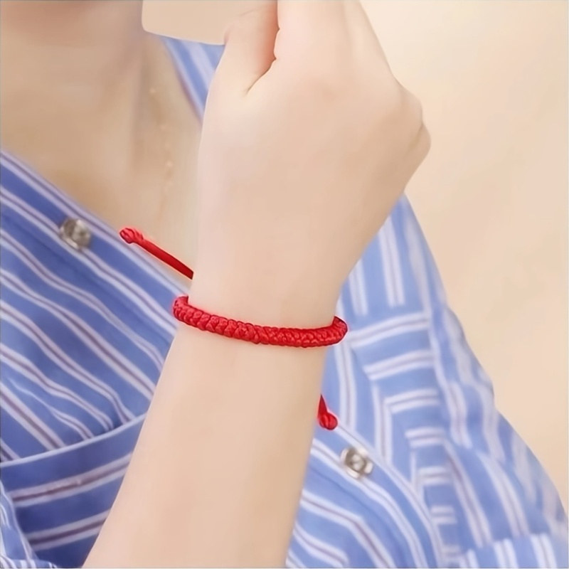 Red Rope Bracelet with Powerful Knot for Casual Attire or as Gift